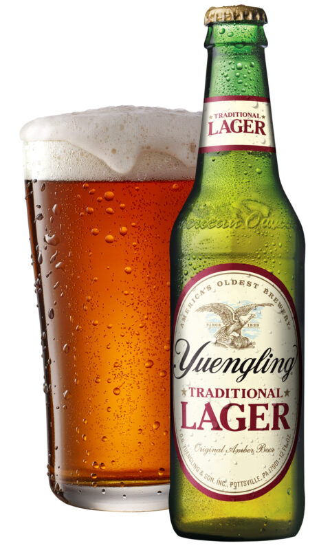 Yuengling Branded Marketing ideal image of bottle into a crisp cold glass
